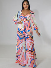 Lässiger, langärmliger Jumpsuit mit Batikmuster und weitem Bein